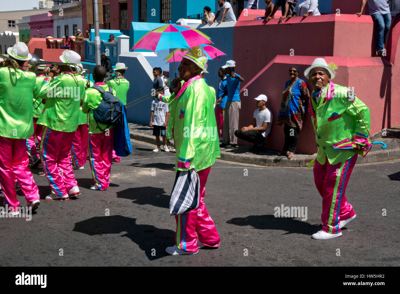 Street parade festival with music band of minstrels and dancers in carnival atmosphere,Bo-Kapp,Malay quarter,Cape Town,South Africa Stock Photo