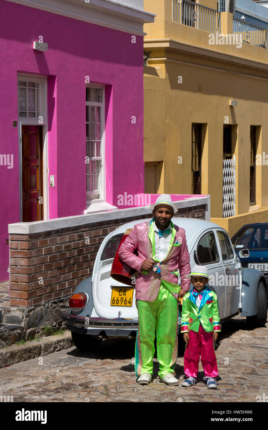 Father and son dressed as minstrels in festival band in Bo-Kaap district,manly quarter,cape town South Africa Stock Photo
