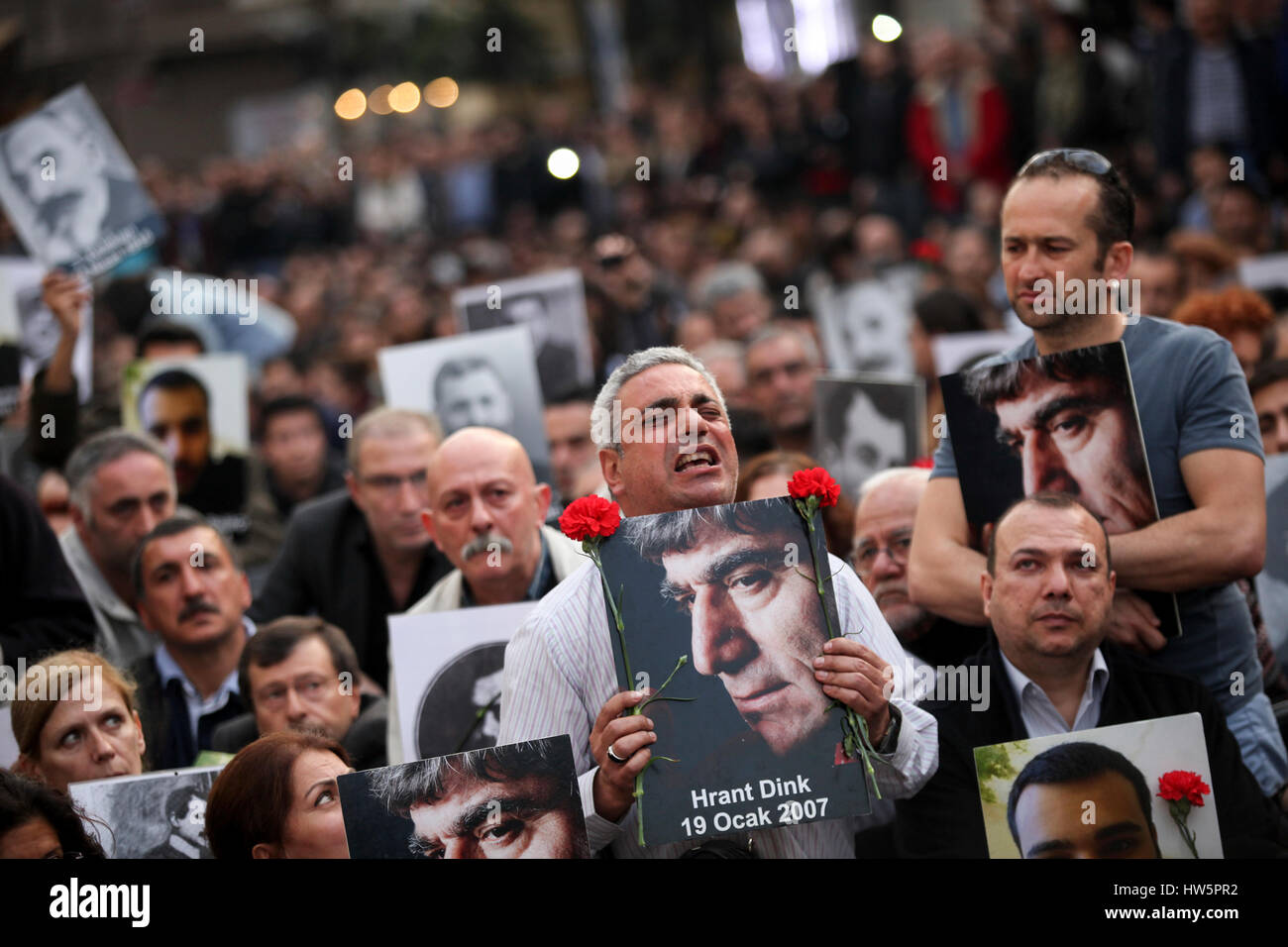 Hrant Dink's wife Rakel Dink (on the middle).  People are protesting the murder of journalist Hrant Dink. Istanbul, Turkey. April 24, 2014 Stock Photo