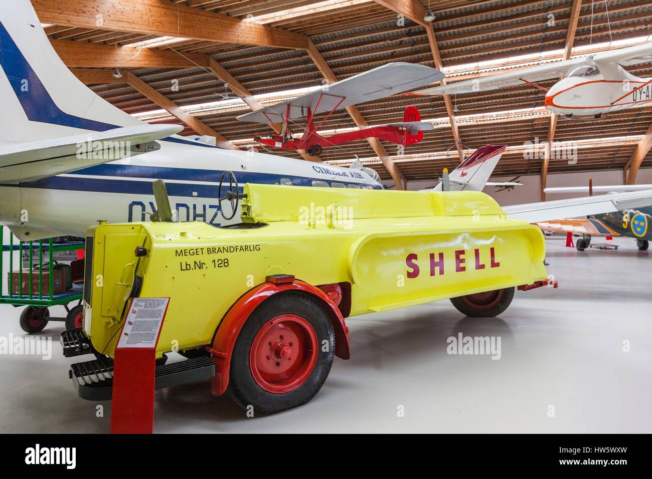 Denmark, Jutland, Stauning, Danish Collection of Vintage Aircraft Museum, 1950s DeHavilland DH-104 Dove airliner with fueling truck Stock Photo