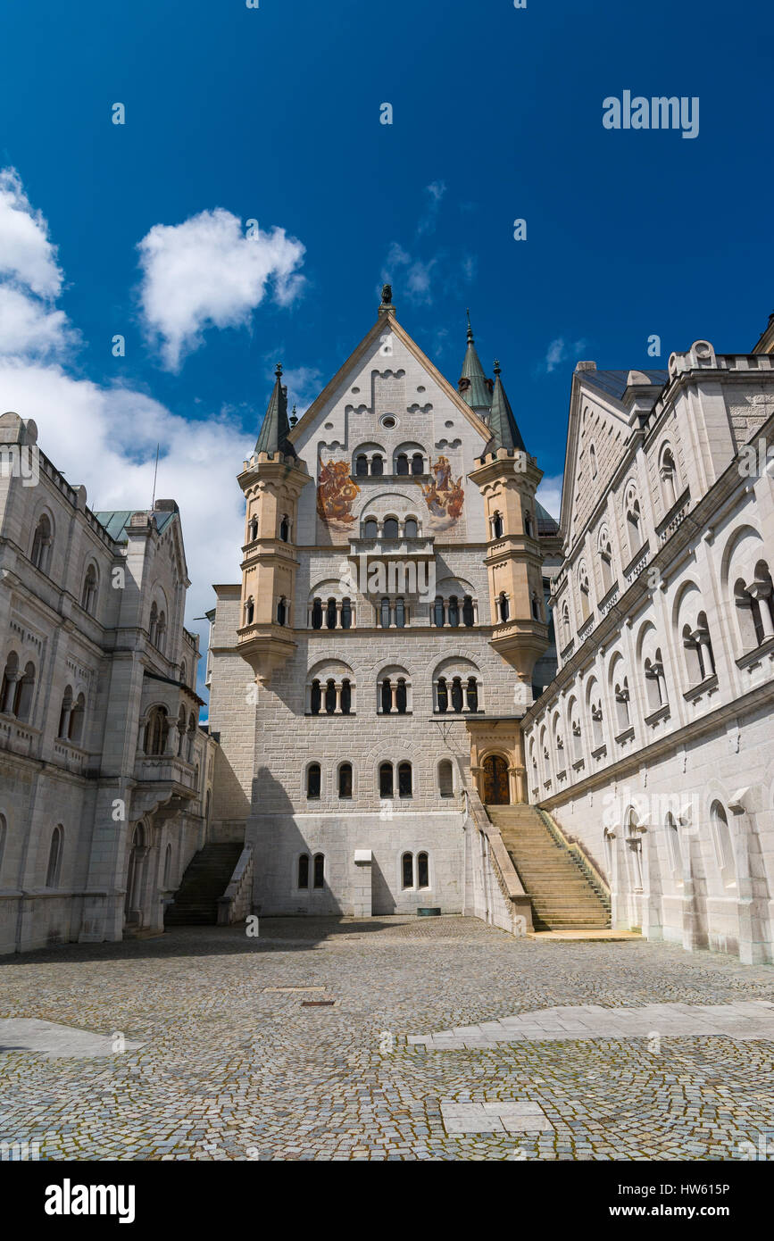Neuschwanstein Castle. View from location of unrealized chapel along upper courtyard level: Bower, palace front, and Knights House. Stock Photo
