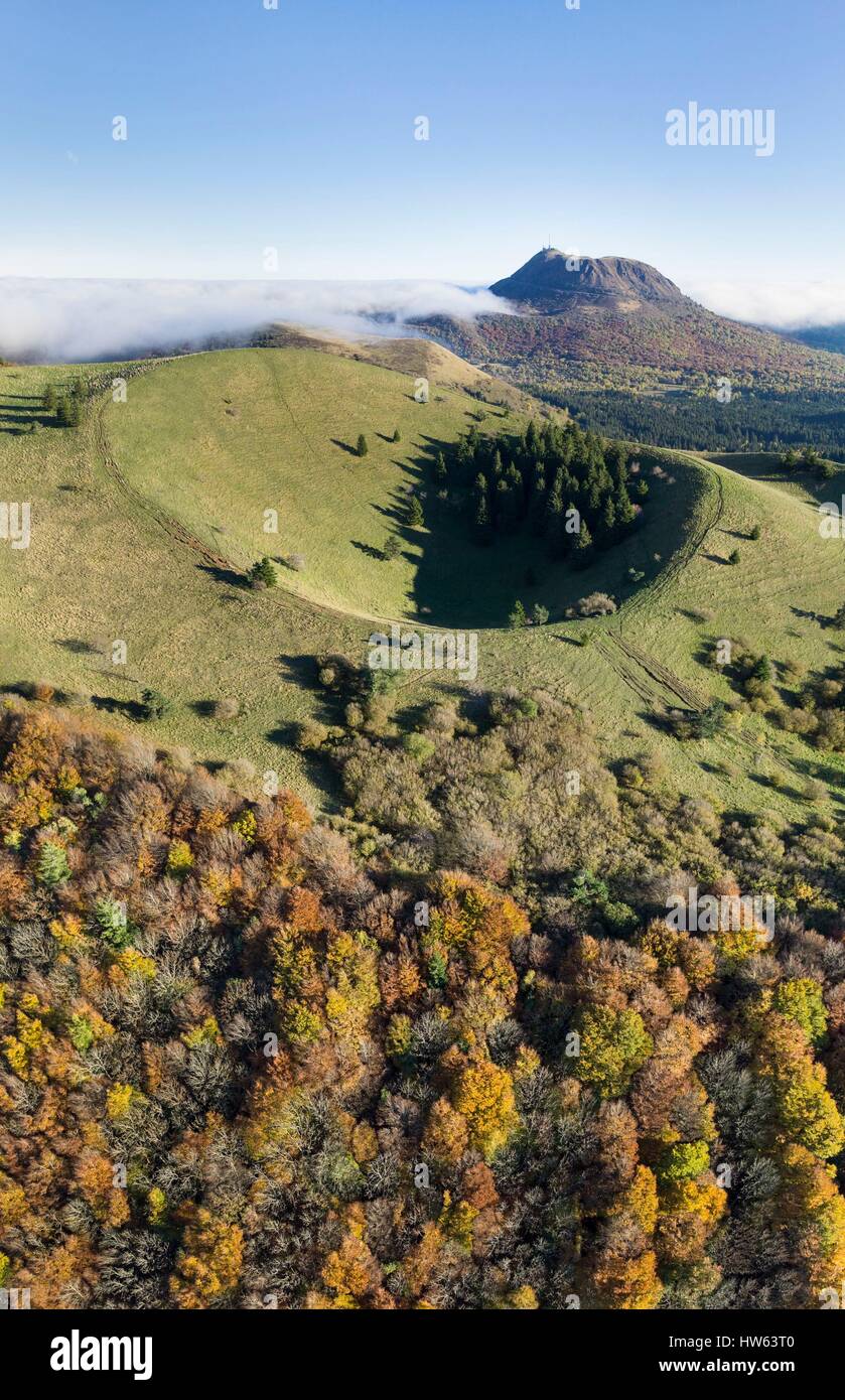 France, Puy de Dome, Ceyssat, Chaine des Puys, Regional Natural Park of the Auvergne Volcanoes, Puy de Come volcano and Puy de Dome in the background (aerial view) Stock Photo