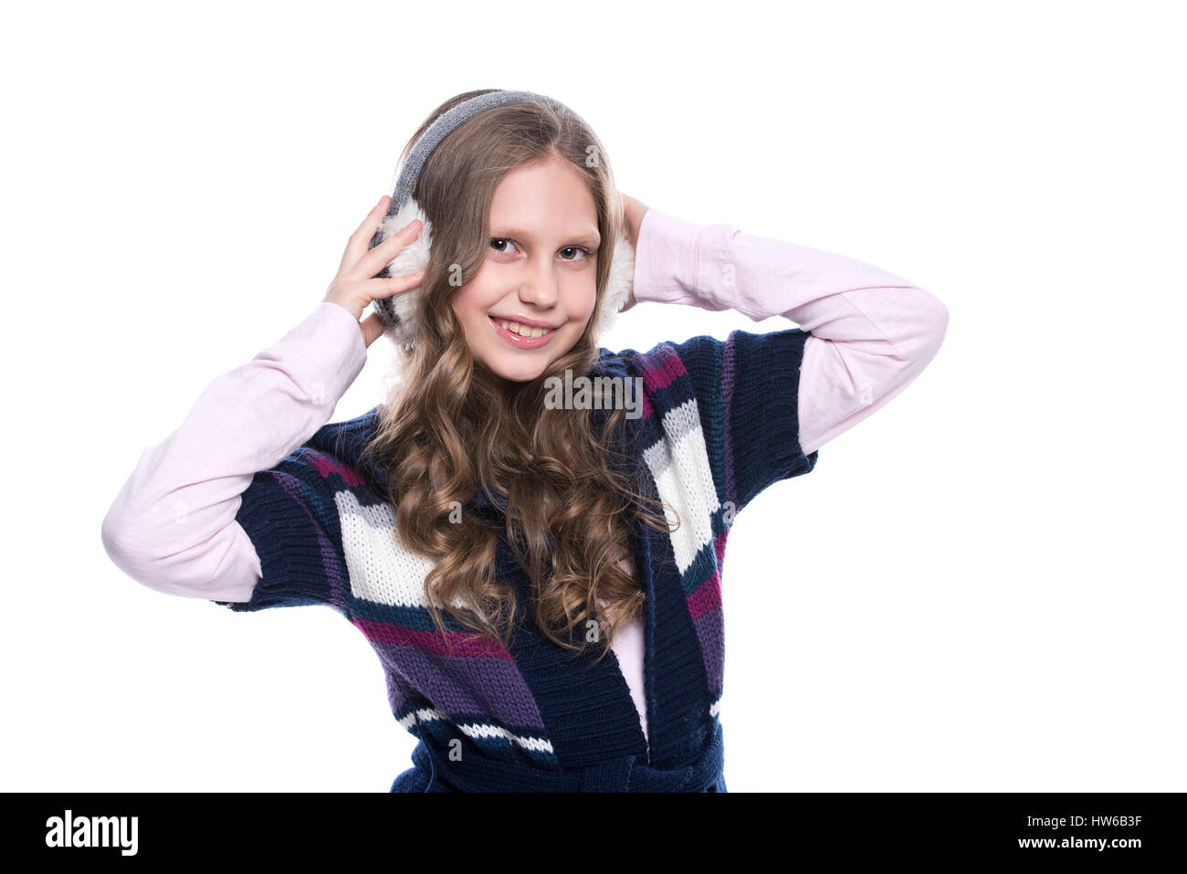 Pretty Smiling Little Girl With Curly Hairstyle Wearing