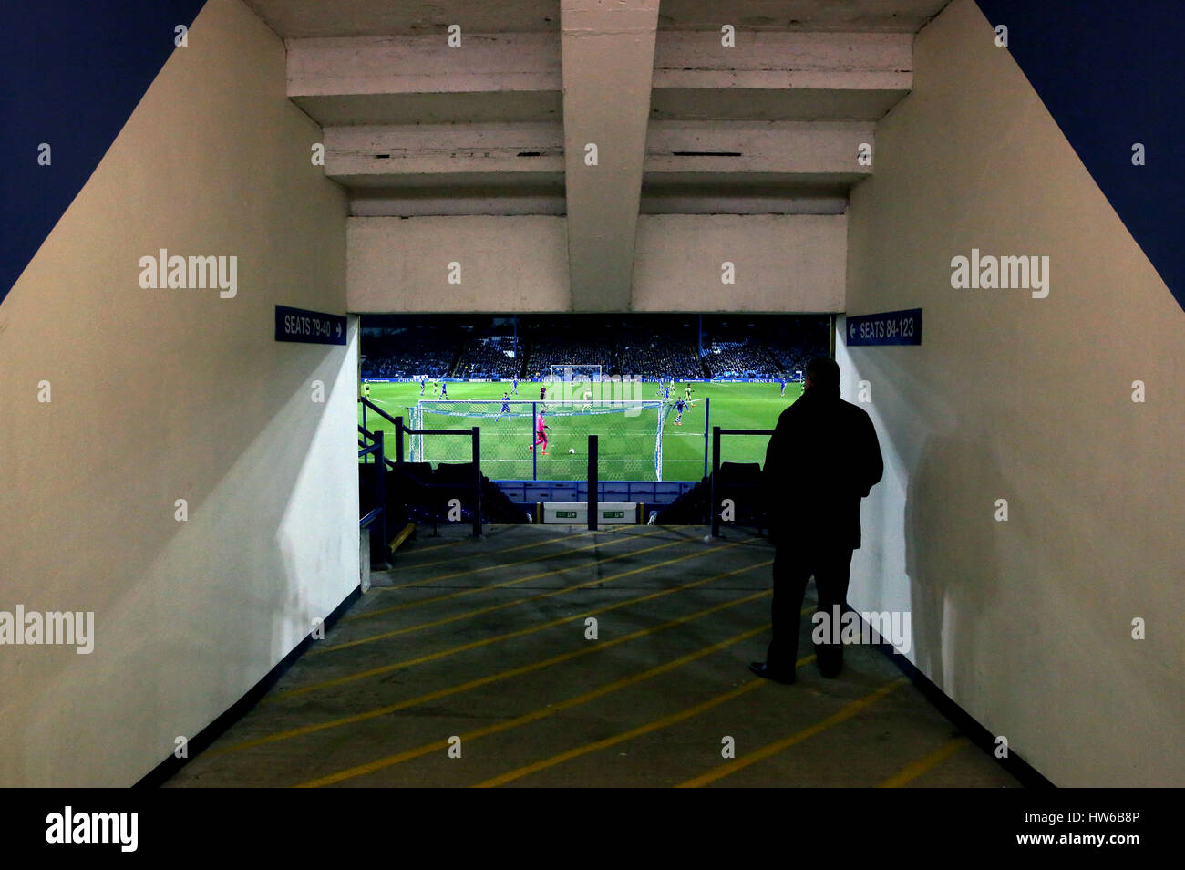 A fan watches the action from a tunnel in the stands during the Sky Bet Championship match at Hillsborough, Sheffield. Stock Photo