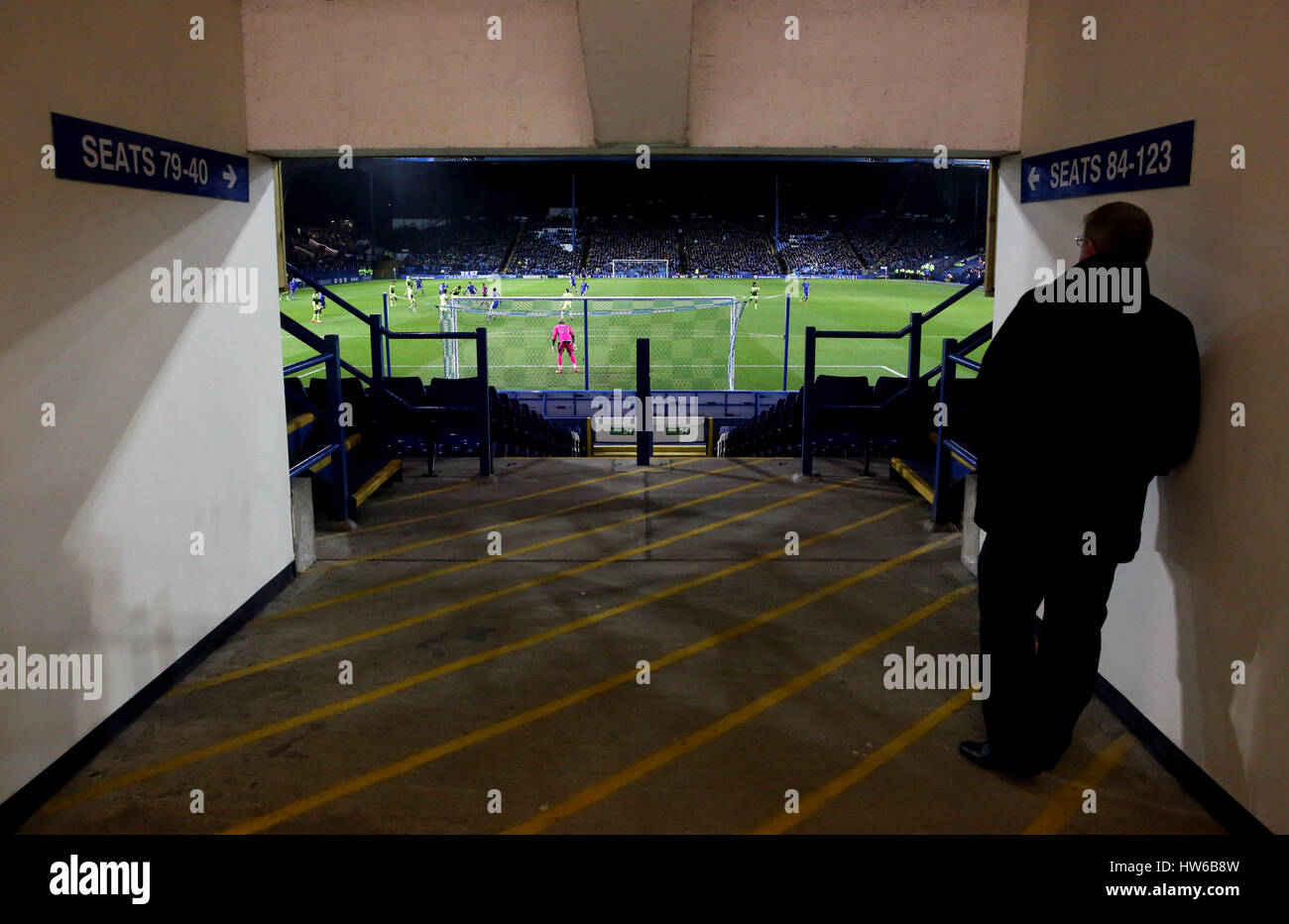 A fan watches the action from a tunnel in the stands during the Sky Bet Championship match at Hillsborough, Sheffield. Stock Photo