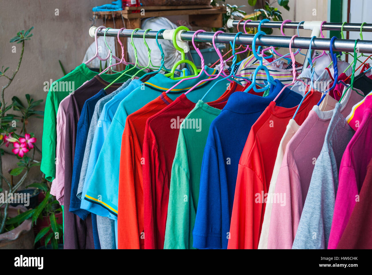 Shirts on clothes rail hi-res stock photography and images - Alamy