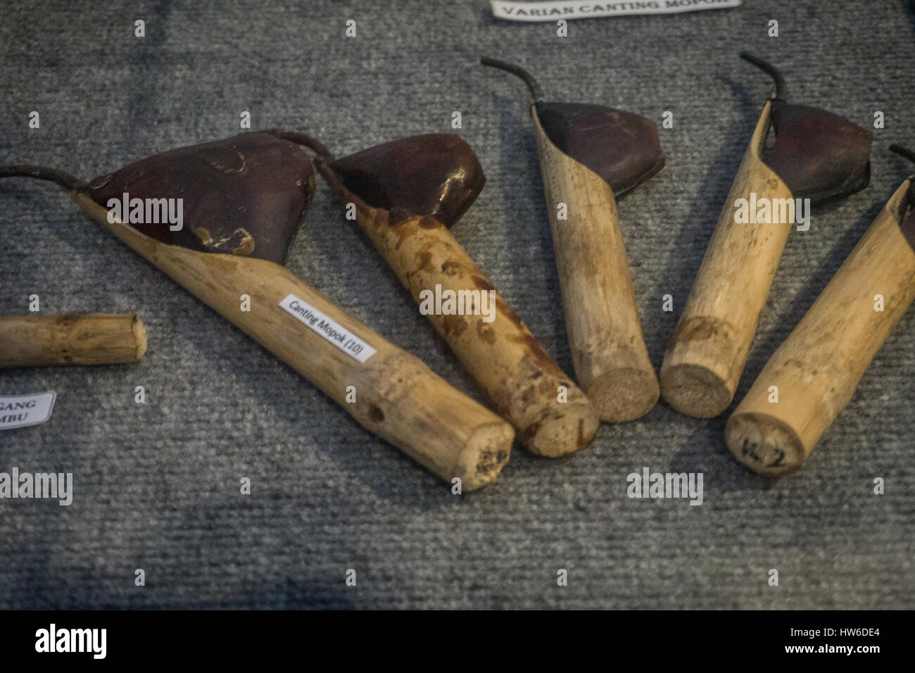 Bamboo canting filling with hot wax for drawing Batik pattern photo ...