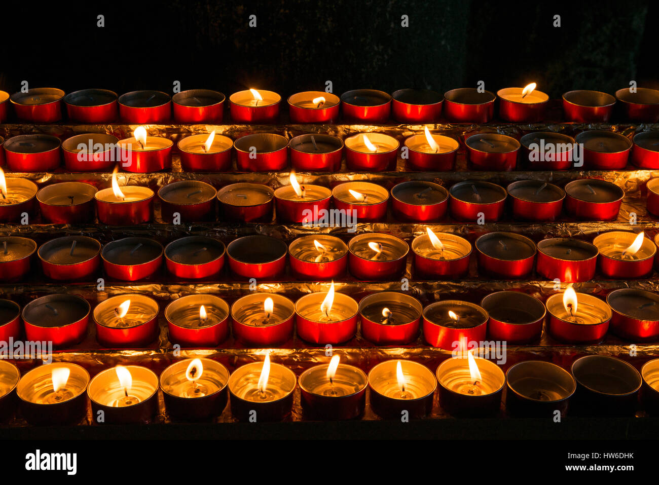 Burning candles in church Stock Photo Alamy