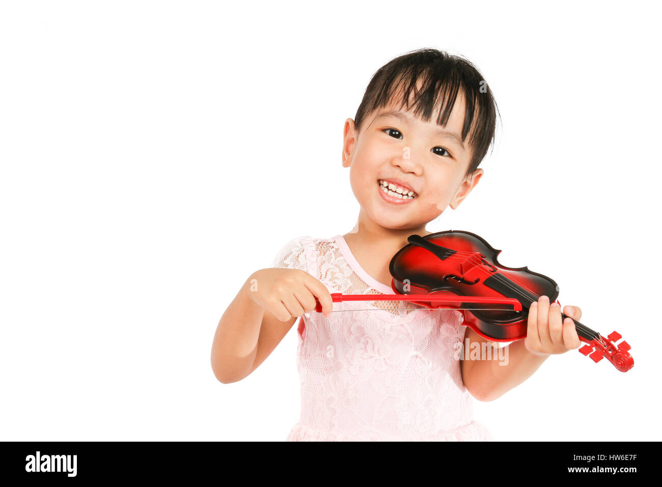 Chinese Little Girl Playing Violin on a white background Stock Photo ...