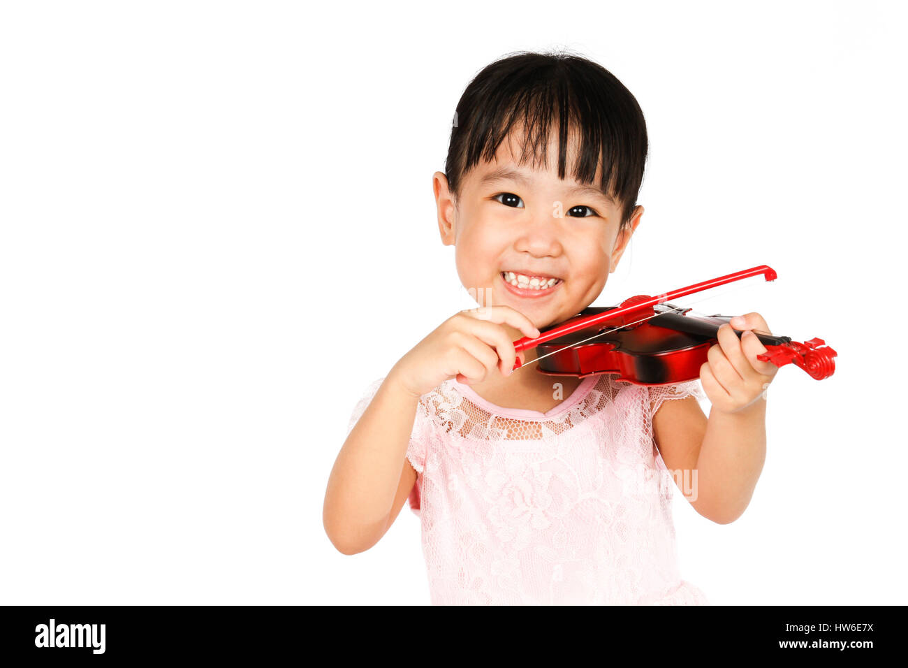 Chinese Little Girl Playing Violin on a white background Stock Photo ...