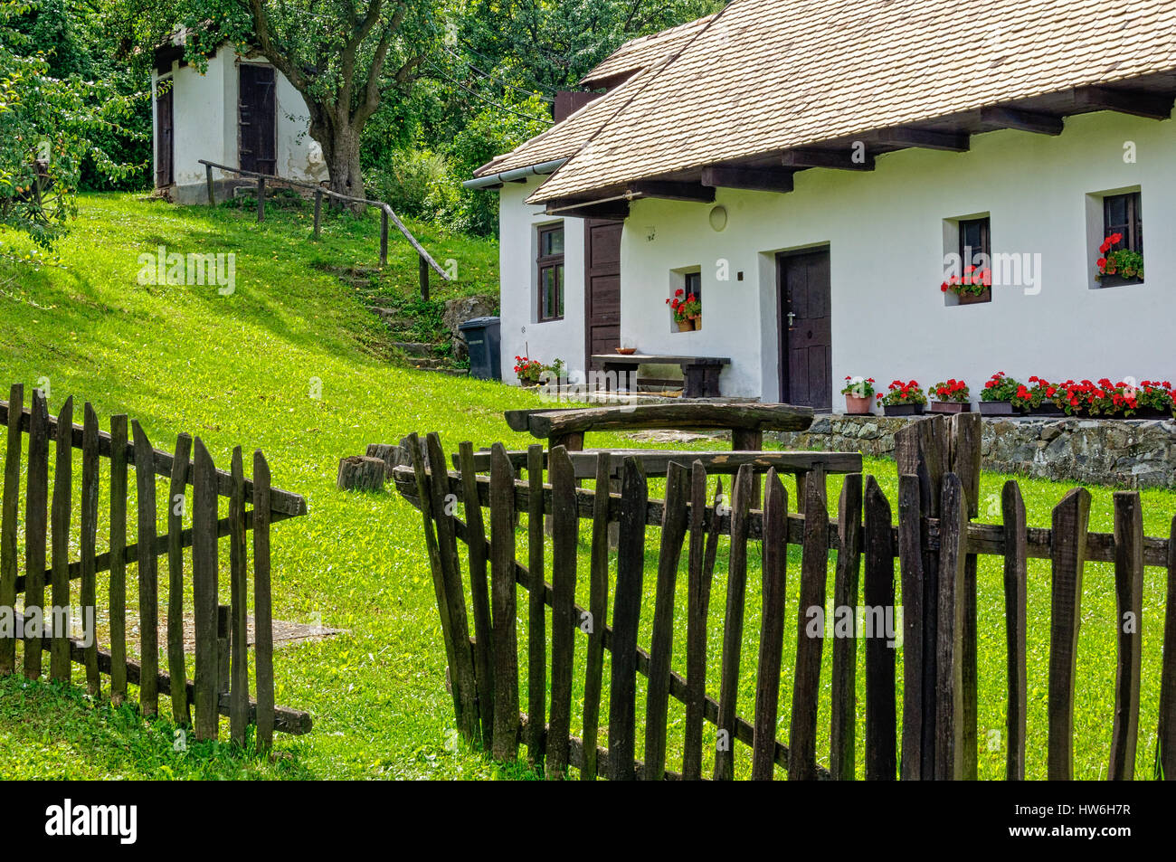 The fence and backyard of a farmhouse in  Holloko, Hungary Stock Photo