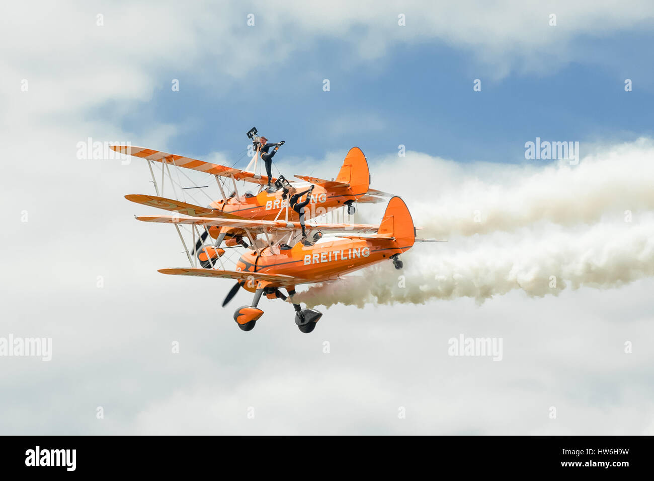 Breitling Wingwalkers aerobatic and gymnastic formation display team performing at the Farnborough Airshow, UK Stock Photo