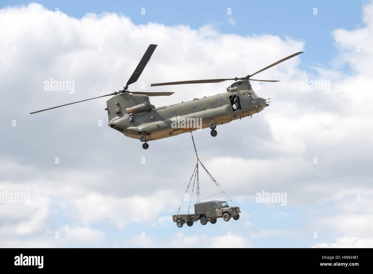 RAF Chinook helicopter in vehicle lift demonstration at the Farnborough Airshow, UK Stock Photo