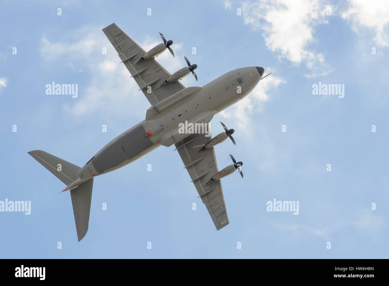Large Airbus A400M military transporter aircraft showing aerobatic capabilities at the Farnborough Airshow, UK Stock Photo