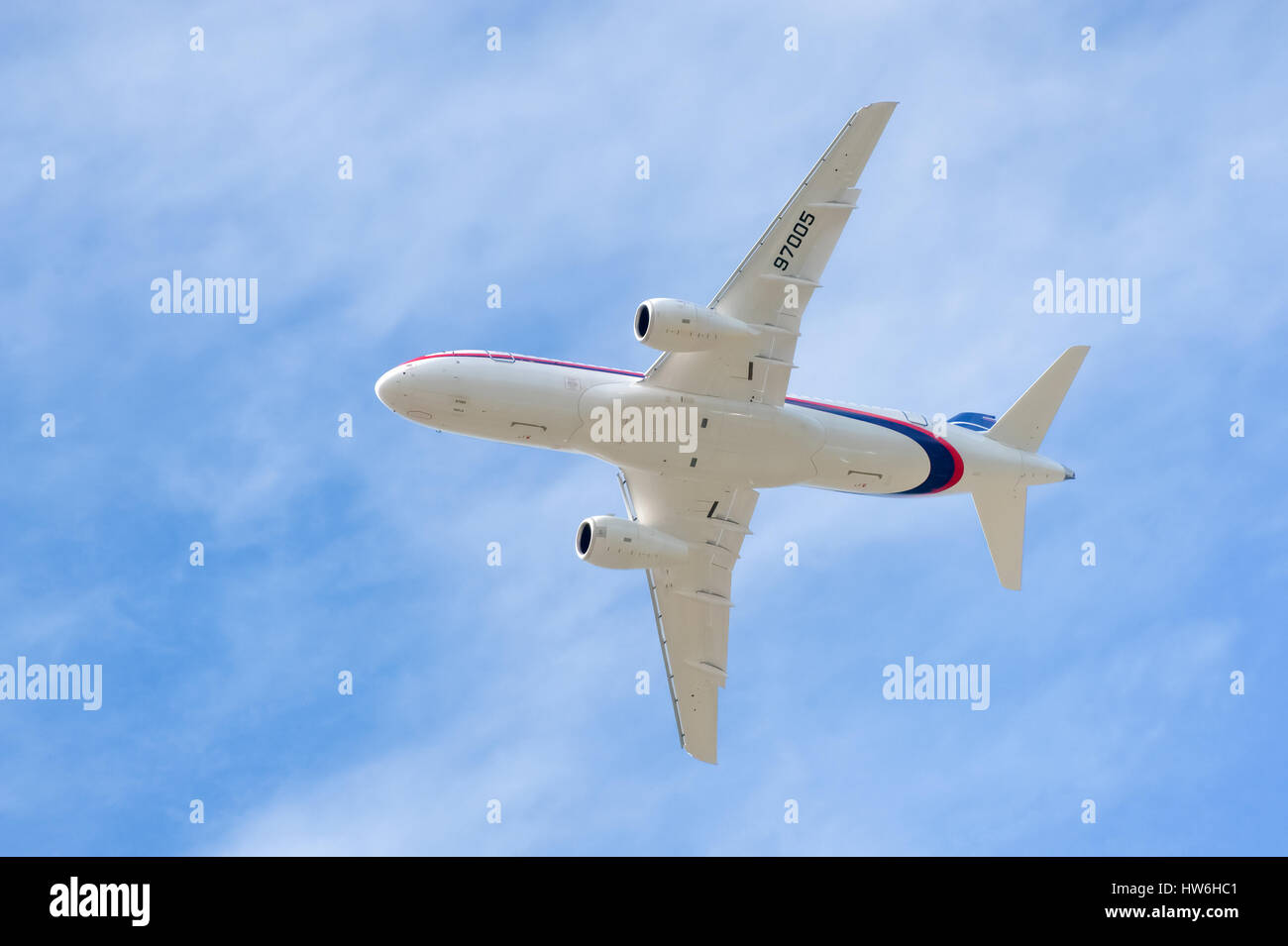 Russian developed Sukhoi Superjet 100-95 passing overhead at the Farnborough Airshow , UK Stock Photo