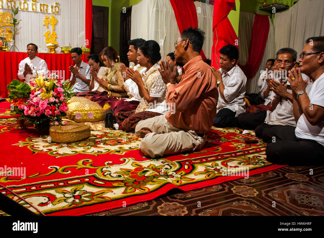 A traditional Buddhist wedding ceremony is being observed by