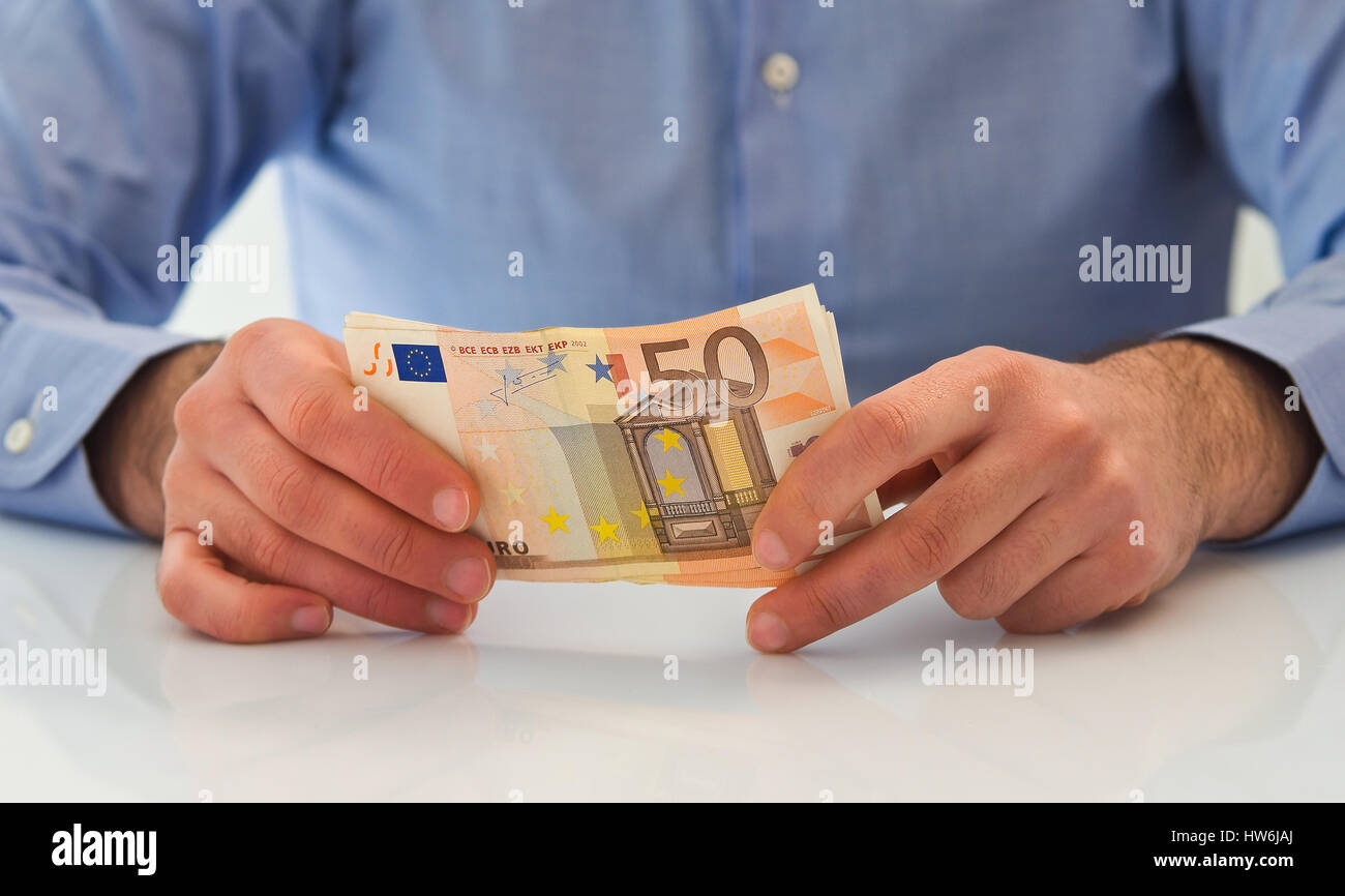 Man handling money Stock Photo Alamy