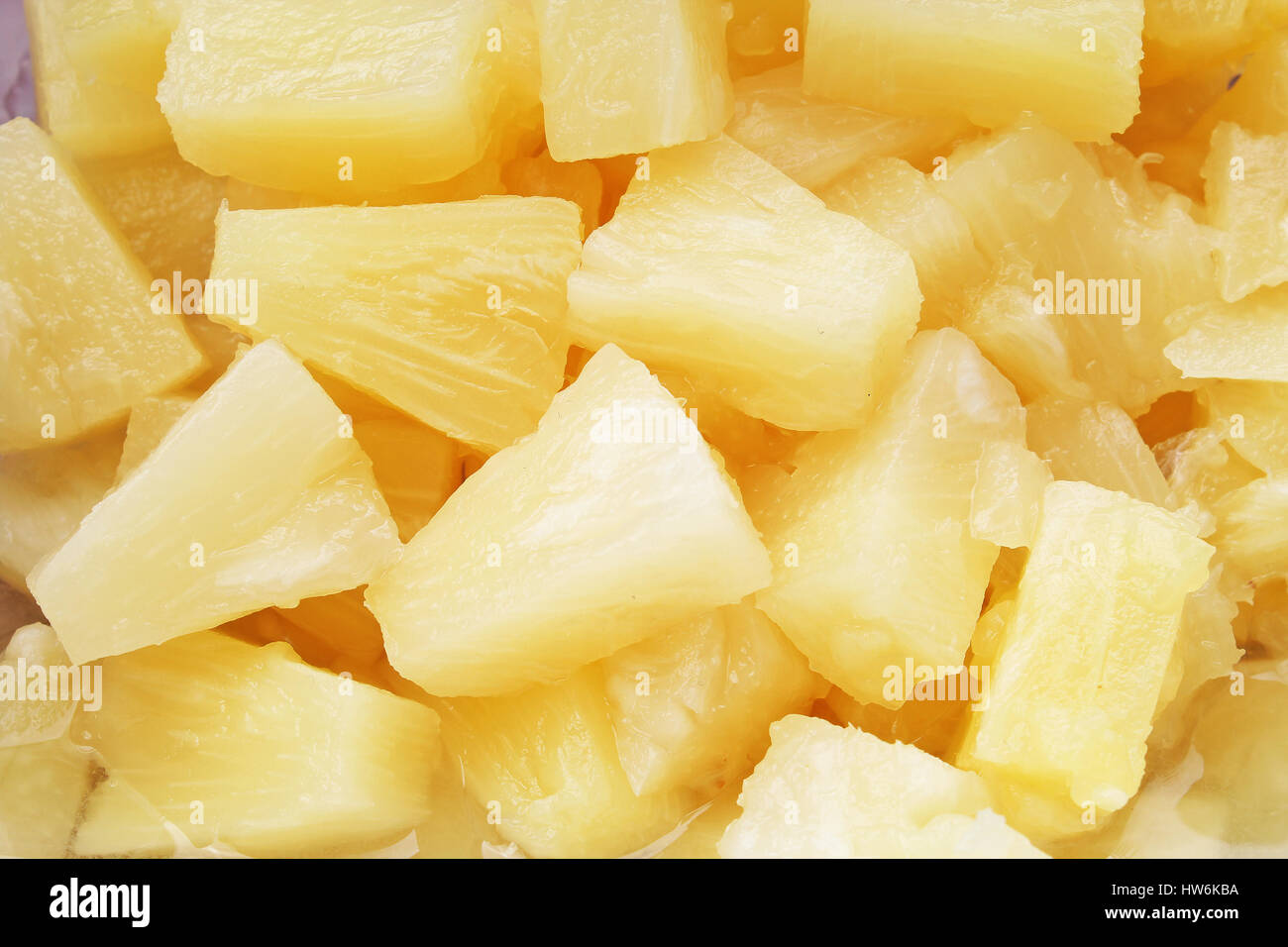 Pineapple slices as background. Stock Photo