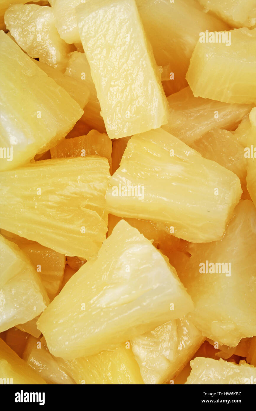 Pineapple slices as background. Stock Photo