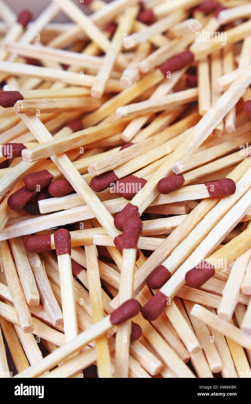Match sticks with brown heads in a row. Fire Matches texture pattern concept. Stacked matches as background Stock Photo