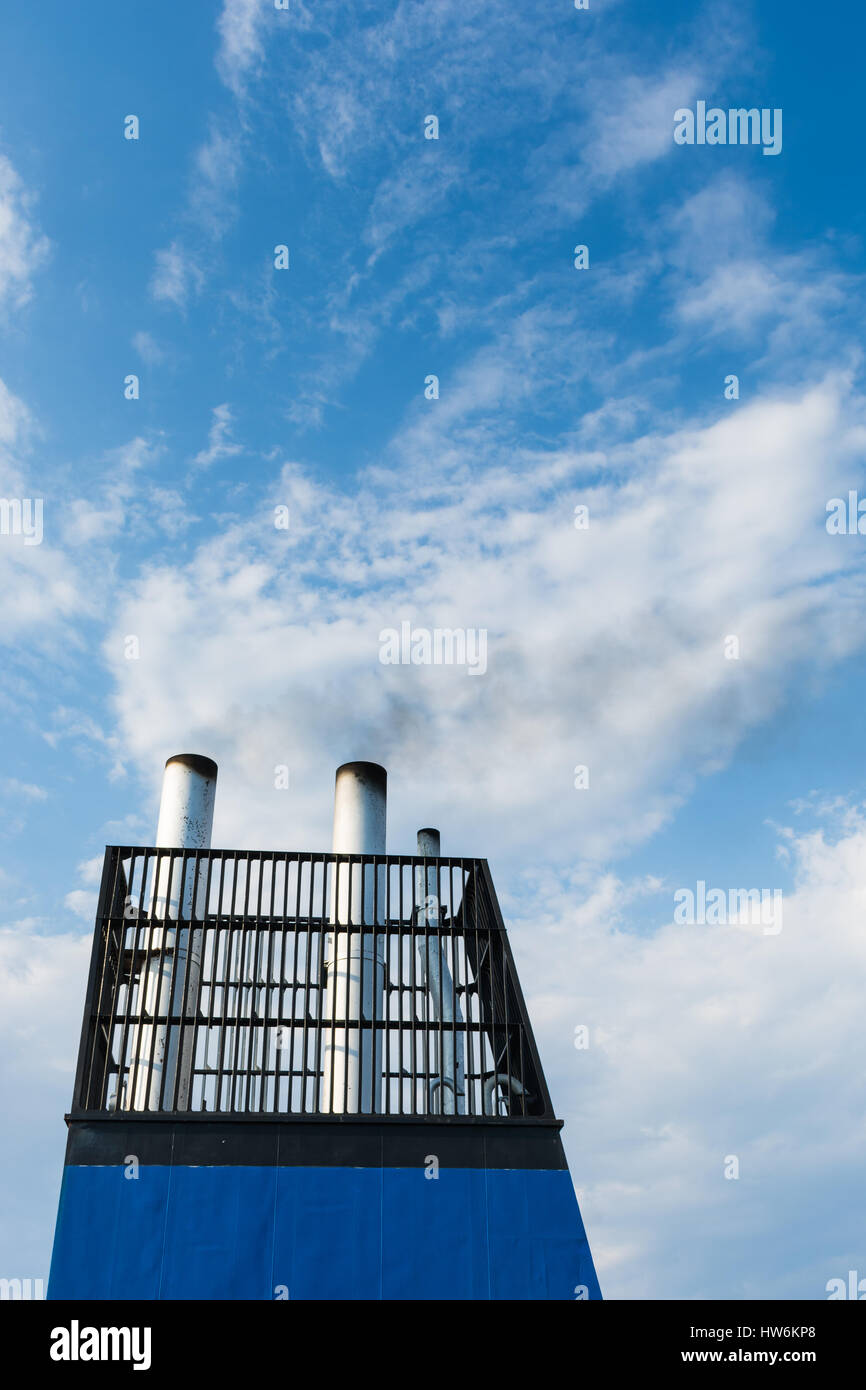 Aboard, chimney of a ferry or cruise ship, black smoke. Pollutes the ...
