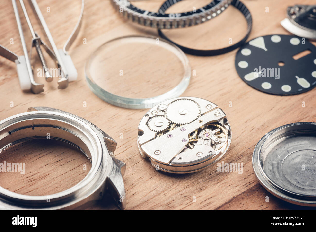 closeup the parts of automatic wristwatch, watch reparing concept Stock
