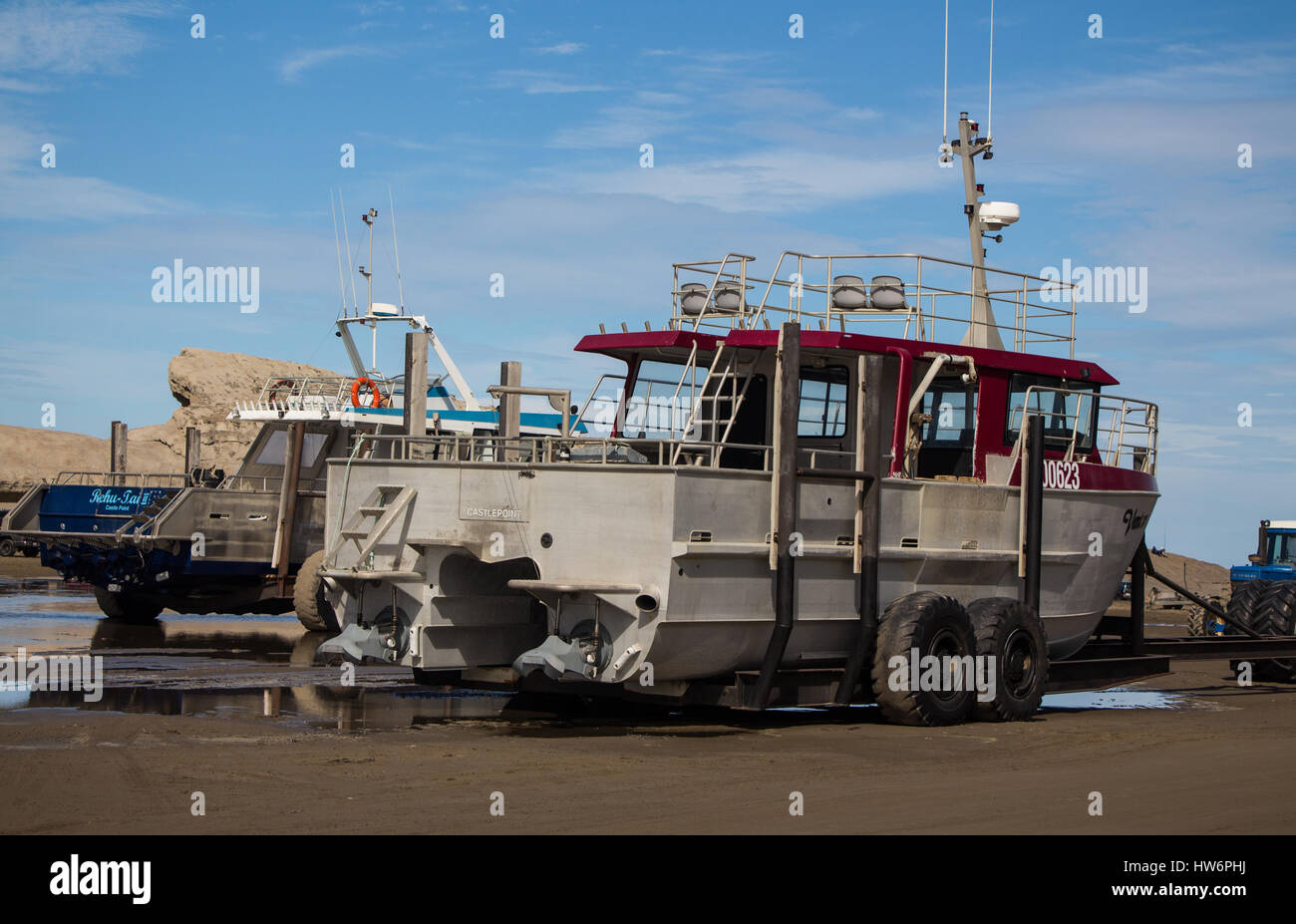 Two large fishing boats on trailers Stock Photo Alamy