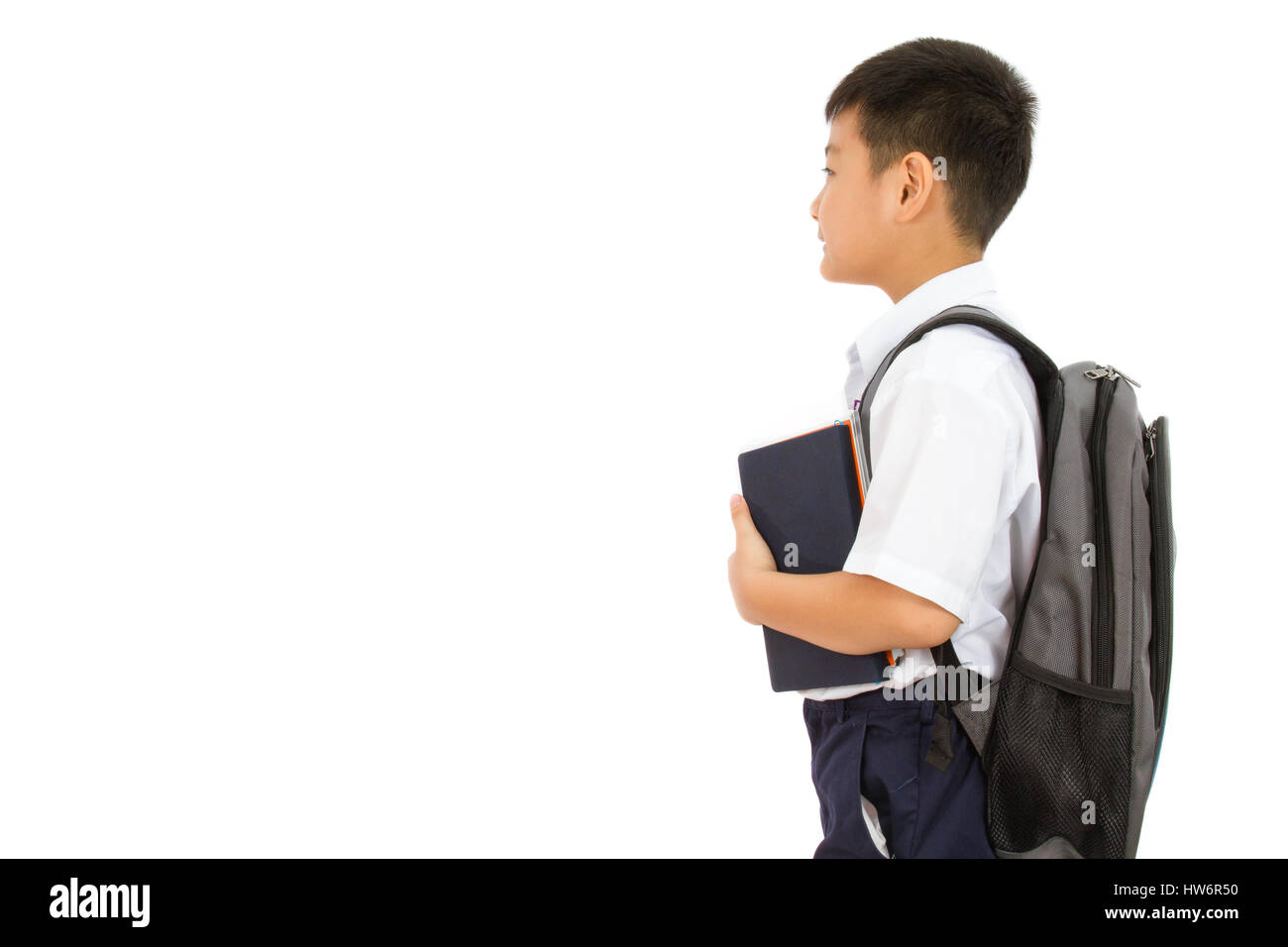 Asian Little School Boy Holding Books with Backpack on White Background ...