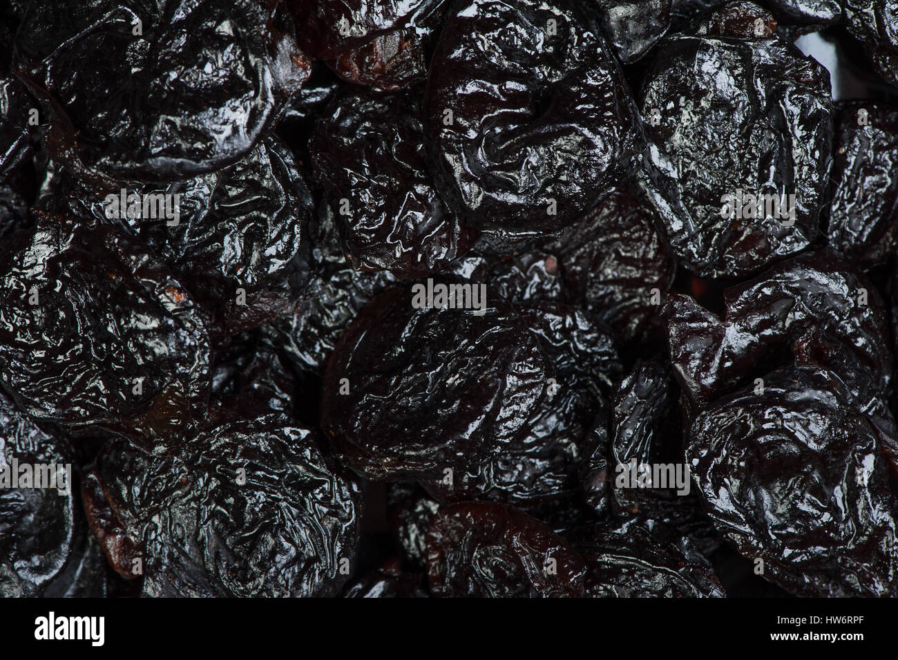 Top view of prunes as background texture Stock Photo - Alamy