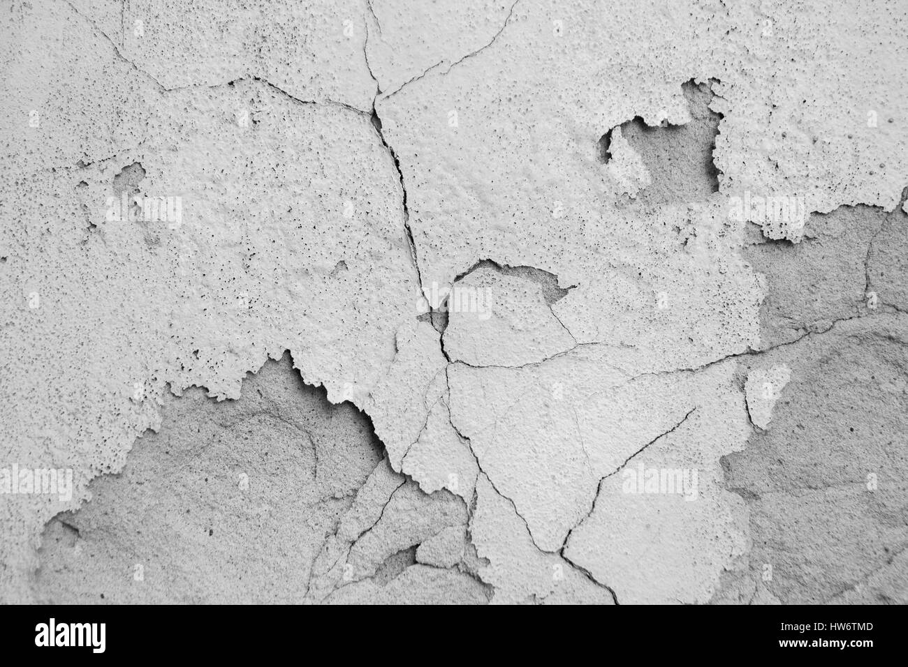 cracked paint on building facade Stock Photo