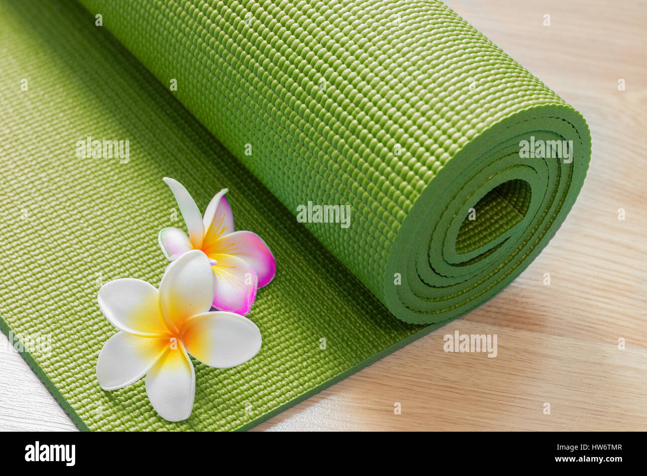yoga mat with flowers Stock Photo