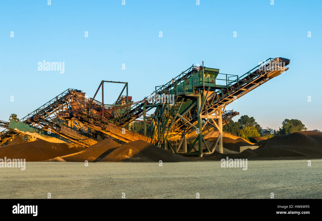 Large machine used to crush stone into gravel Stock Photo Alamy