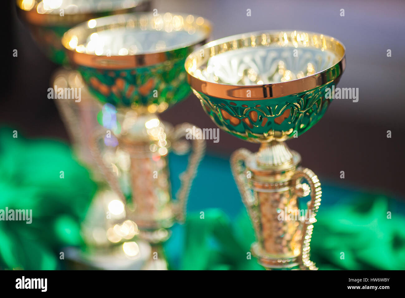 Victorious cups in sports meets. Cups of winners. Trophy cups Stock ...