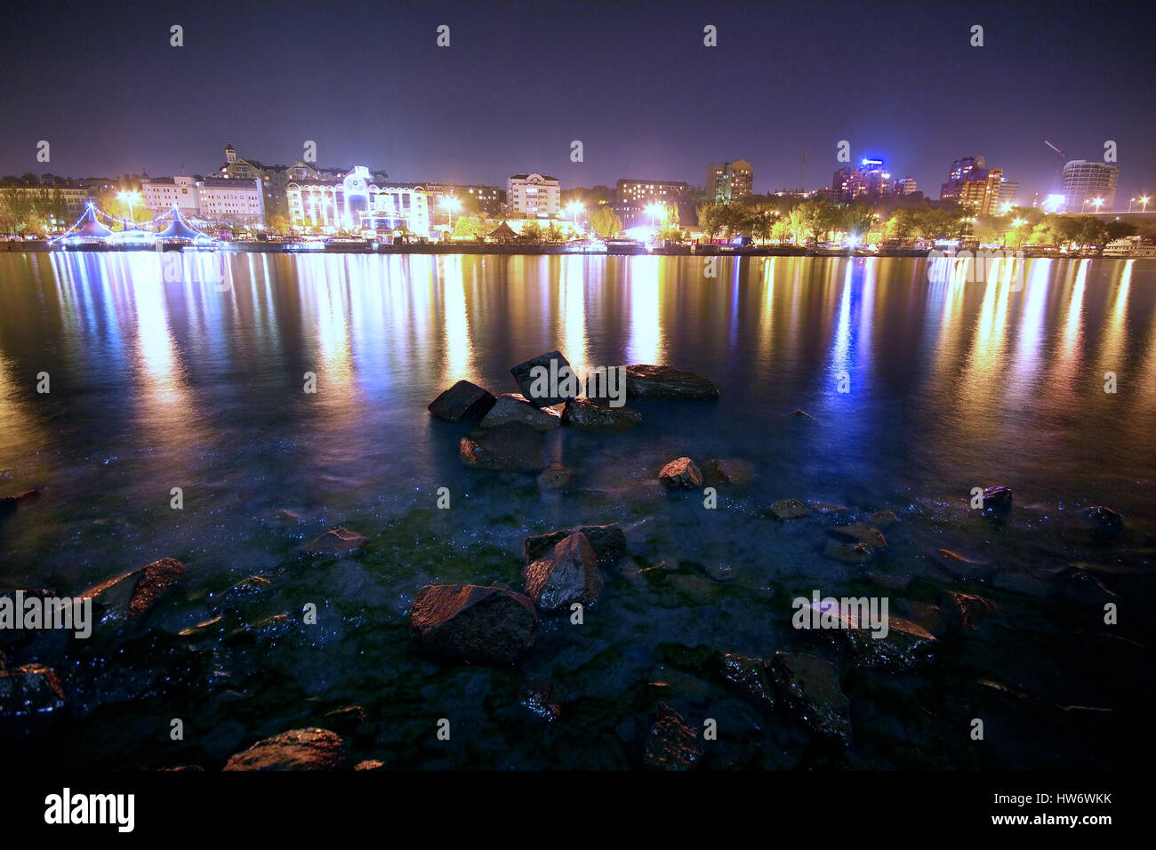 fires of the night city reflected in the river Stock Photo - Alamy