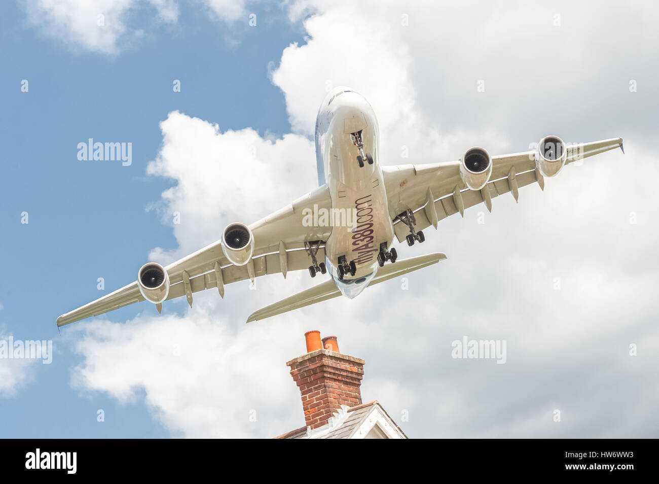 Airbus A380 on a low banked approach before landing at an aviation trade event. Stock Photo