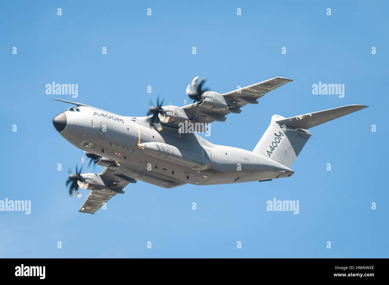 Closeup of an Airbus A400M military and emergency aid transporter aircraft in low-level flight over Farnborough, UK Stock Photo