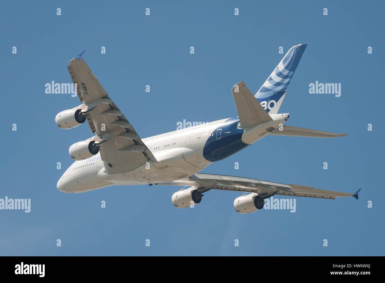 Closeup of an Airbus A380 super-jumbo jet airliner in flight over Farnborough, Hampshire, UK Stock Photo