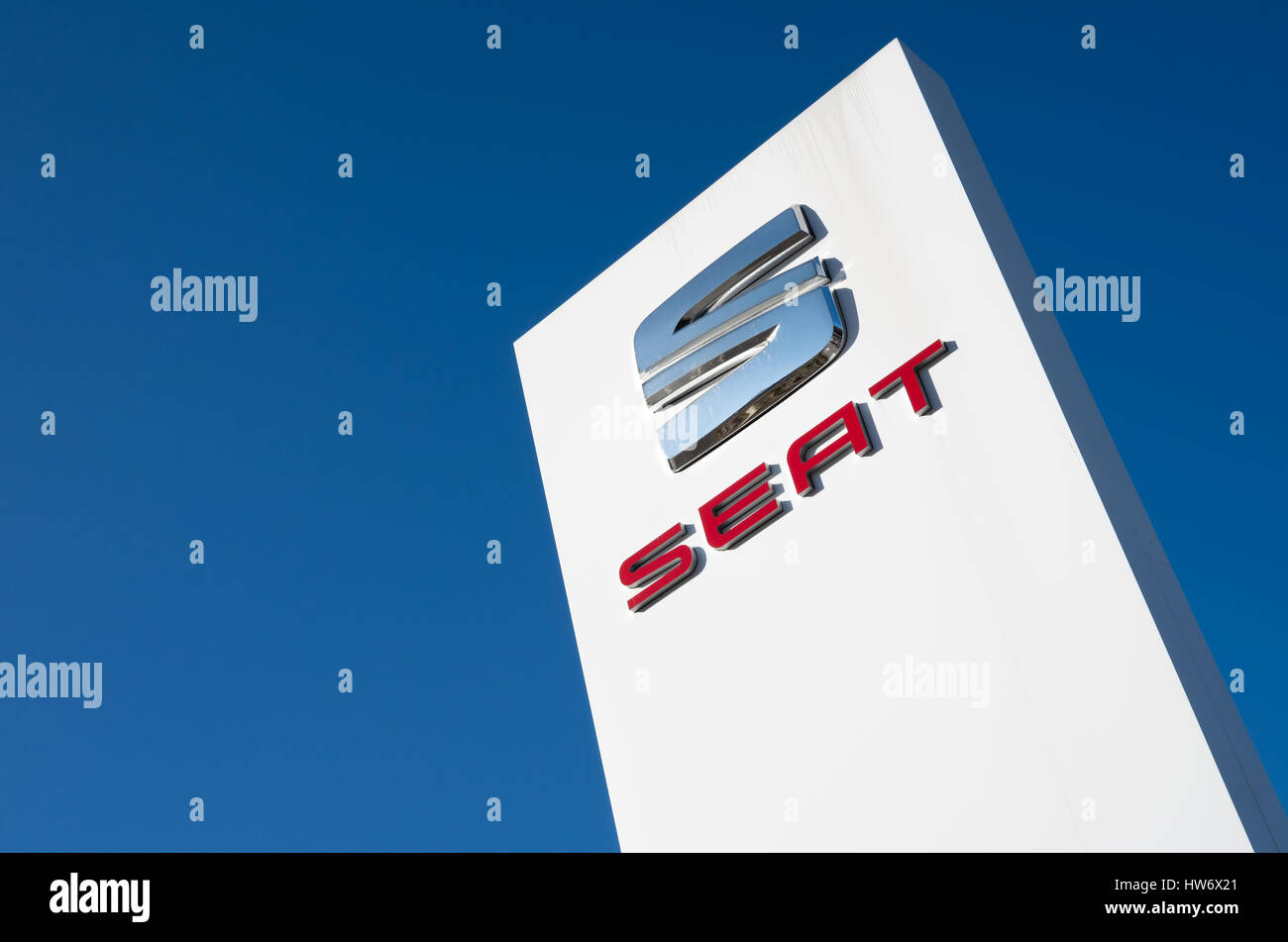 SEAT dealership sign against blue sky Stock Photo