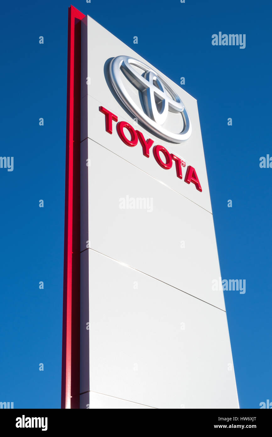 toyota-dealership-sign-against-blue-sky-stock-photo-alamy