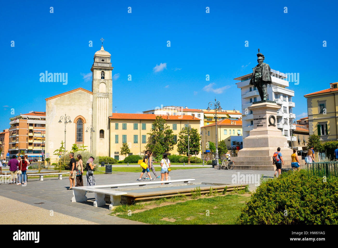 Pisa, Italy - June 25, 2016: Tourists visit the old town in Pisa, Italy reknown for its leaning tower. Stock Photo