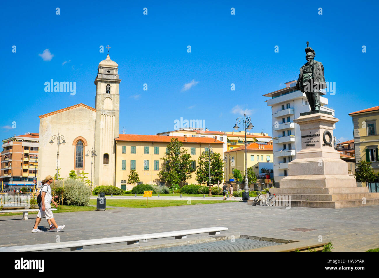 Pisa, Italy - June 25, 2016: Tourists visit the old town in Pisa, Italy reknown for its leaning tower. Stock Photo