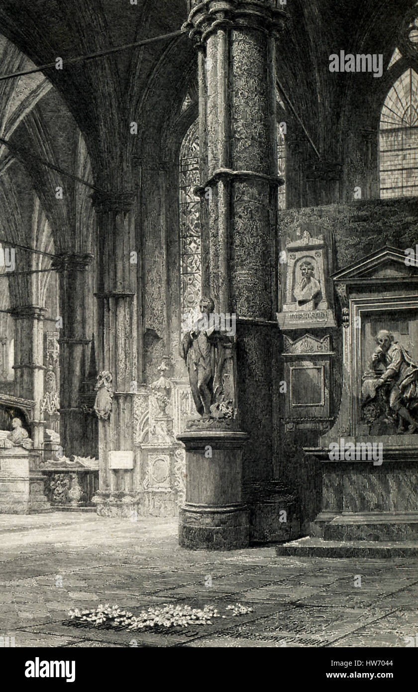Dickens’ tomb is in the south transept of the Poets' Corner at Westminster Abbey in London, England, and is marked by a small stone inscription (area pictured here).This was per Dickens' wish and he wrote in his will: that my name be inscribed in plain English letters on my tomb... I rest my claims to the remembrance of my country upon my published works. Charles Dickens died June 9, 1870, and was buried at the Abbey on June 14. Charles Dickens (1812-1870) was an English writer and social critic, and considered by some the best novelist of the Victorian era. Stock Photo