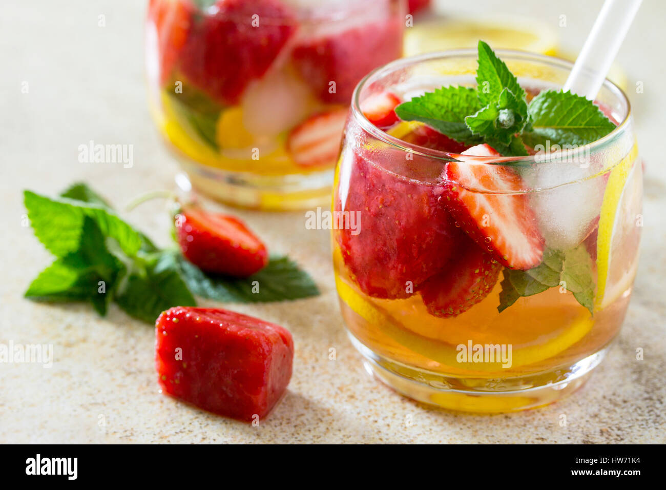 Strawberry juice with copy space on brown stone background. The concept