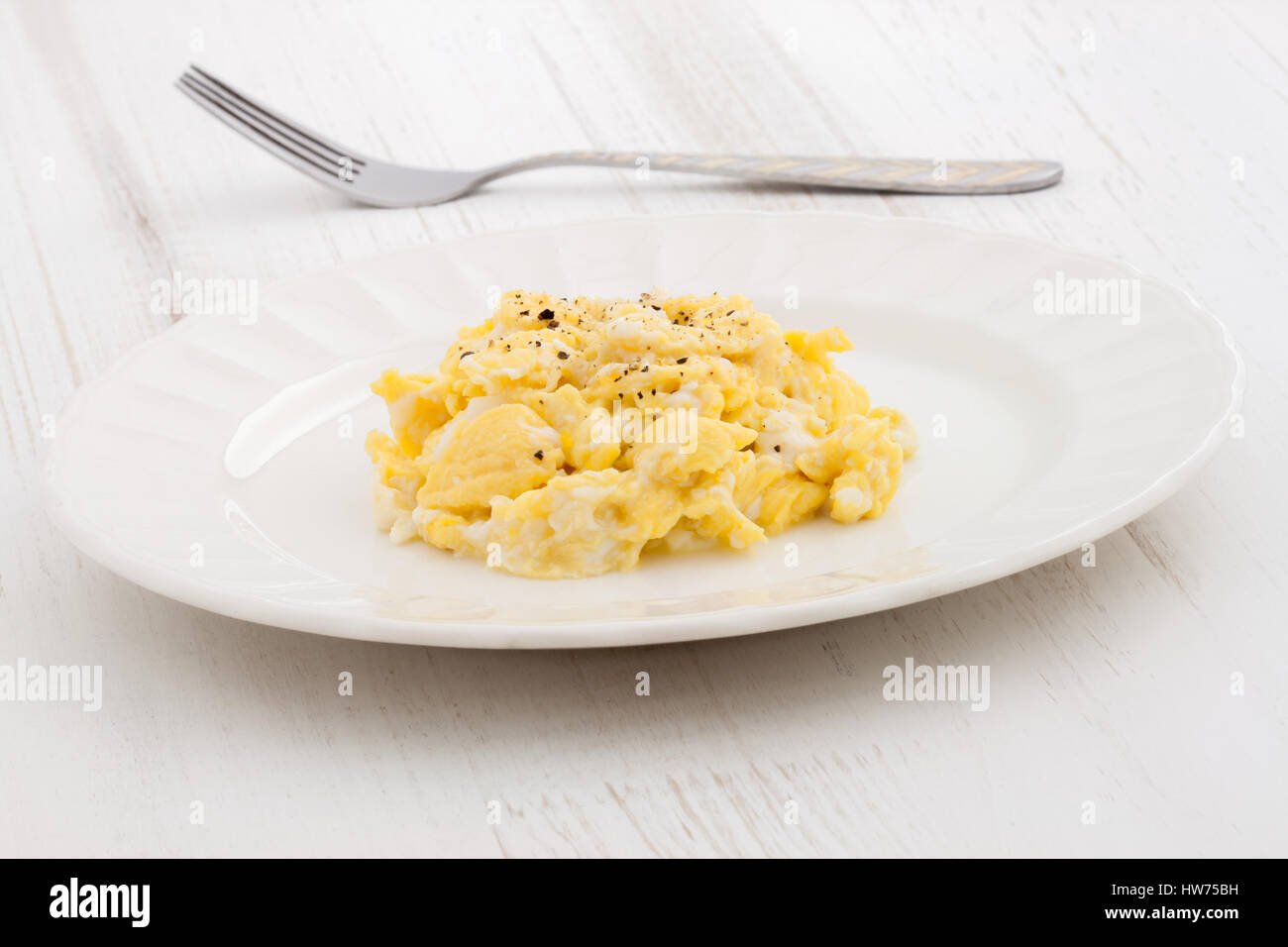 fast and nutritious scrambled eggs wholesome meal plate Stock Photo - Alamy