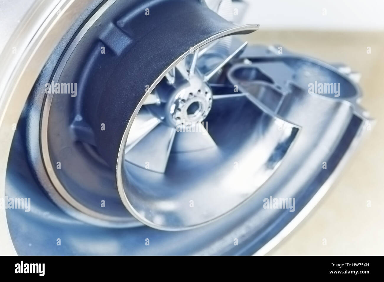 Turbocharger structure scheme with cross section, retro toned closeup photo with selective