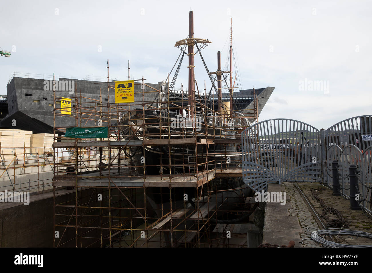 RRS Discovery under refurbishment with the new V&A museum being built in the background in Dundee Scotland Stock Photo