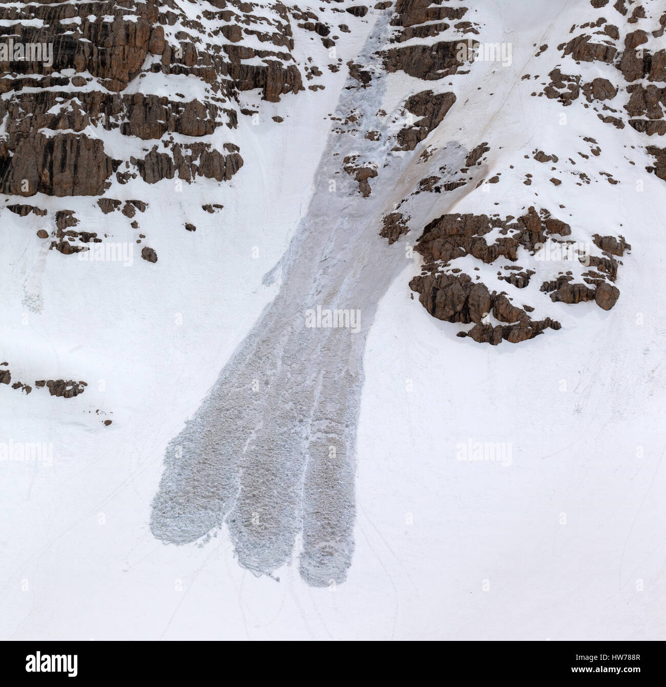 Snowy rocks and avalanche in gray spring day. Turkey, Central Taurus ...