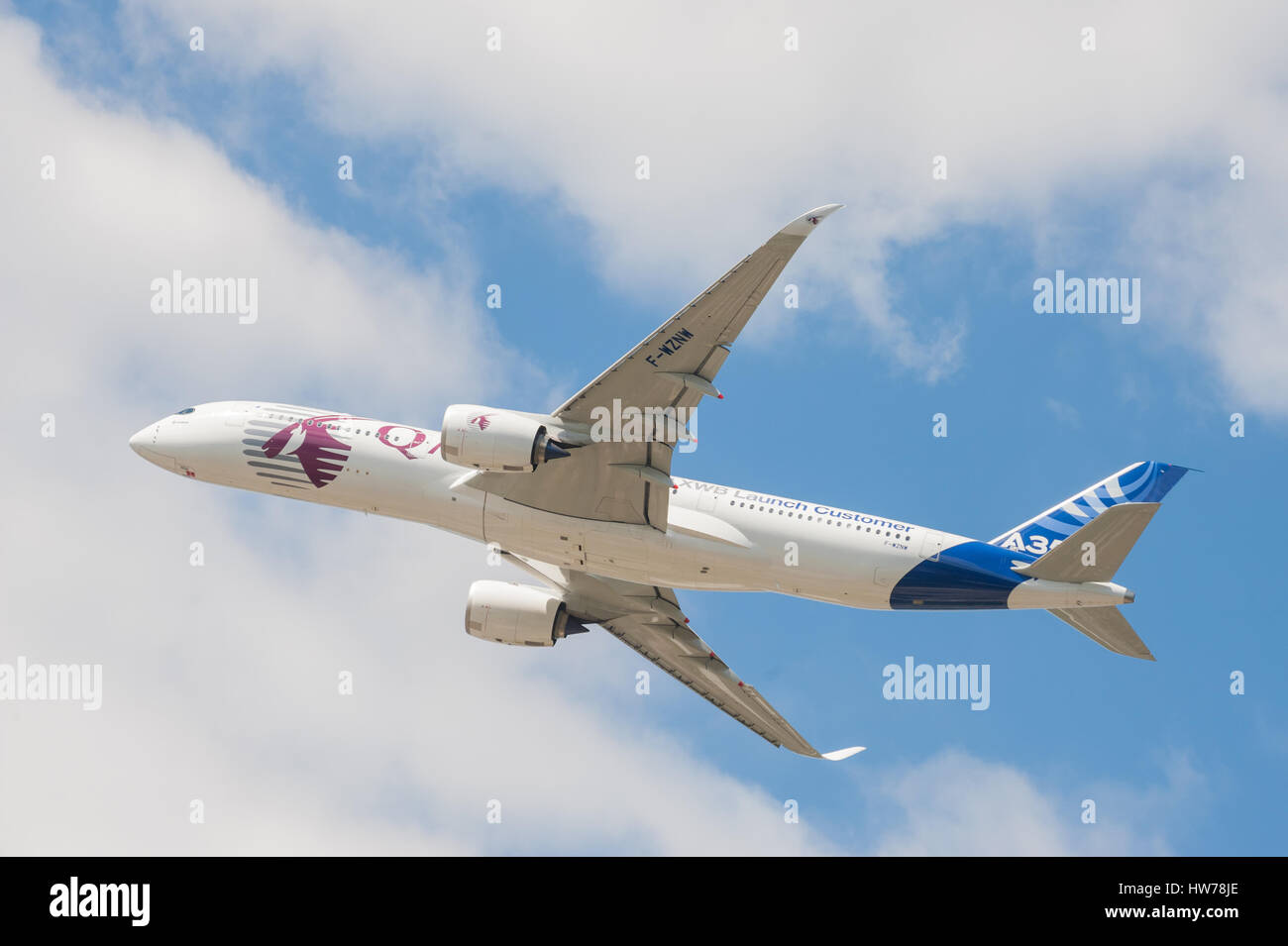 Display flight by a Qatar Airways Airbus A350 at the Farnborough International Airshow, UK Stock Photo
