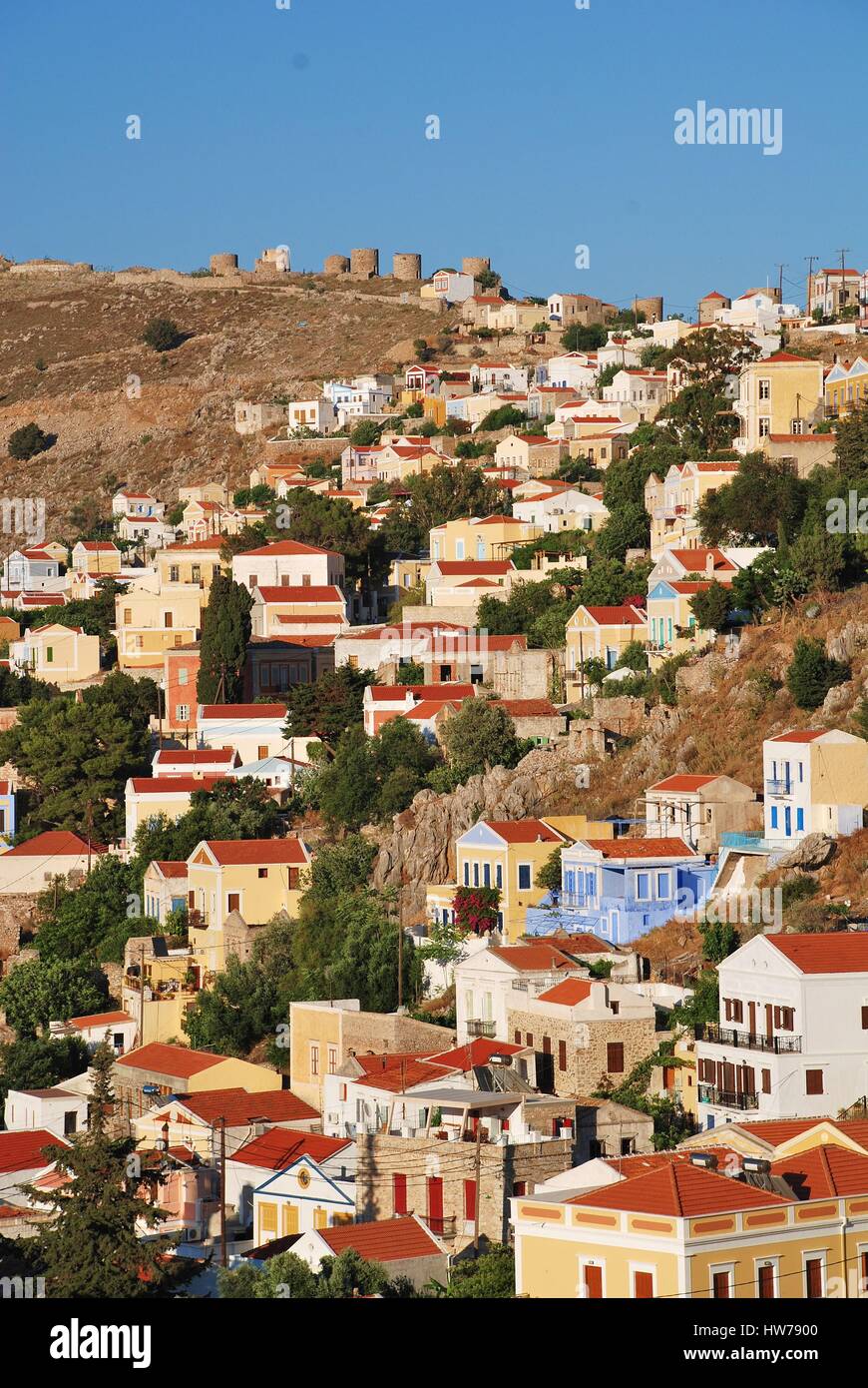 Looking down onto the neo classical buildings of Yialos on the Greek island of Symi. Stock Photo