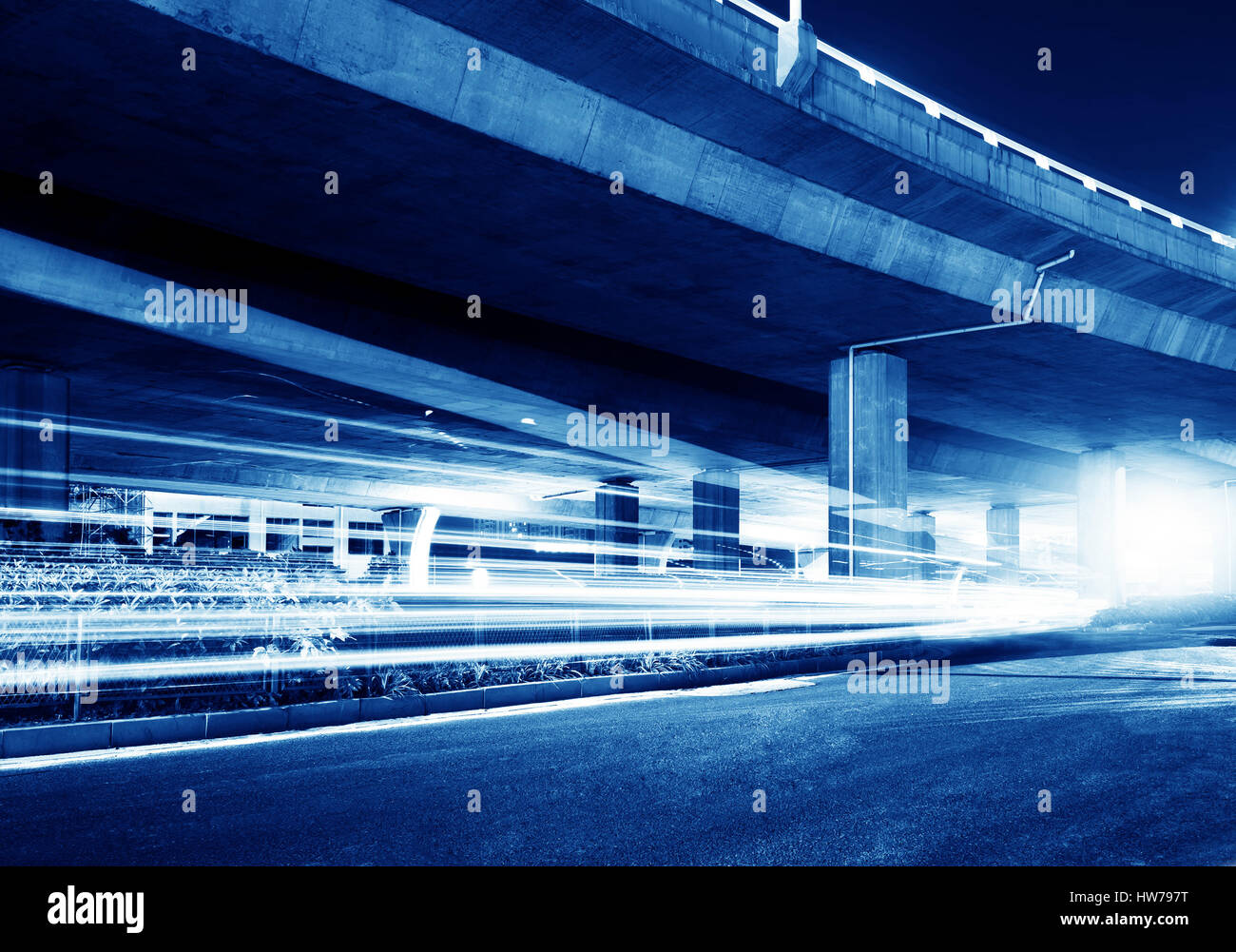 Viaduct below the light trails Stock Photo